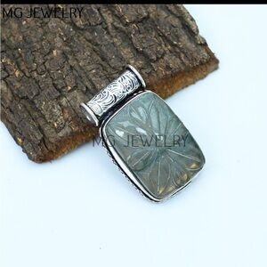 Beautiful Natural Labradorite carved accent Gemstone Pendant.